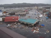 気仙沼市街地を襲う津波　その９（提供：小山裕隆氏）