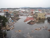 気仙沼市街地を襲う津波　その11（提供：小山裕隆氏）