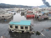 気仙沼市街地を襲う津波　その12（提供：小山裕隆氏）